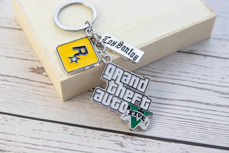 GTA 5 keyring on wooden background