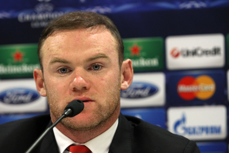 Wayne Rooney speaking at a press conference